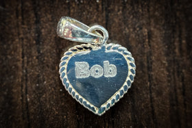 dainty heart pendant with cremation ash engraved